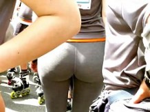 a woman in leggings with big round butt