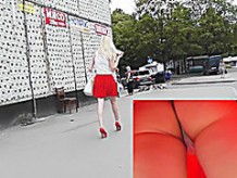 Blond in red gripping with sexy upskirt