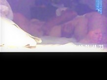 Masturbating her in bed on hidden cam setting on bed table