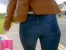 Candid ass in tight jeans tan leather jacket