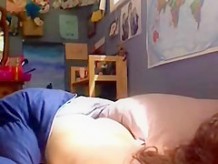My s ister playing on bed