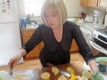 Mature lady spied while baking muffins