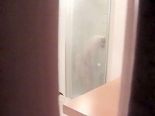 Girl shaves her pussy in the shower