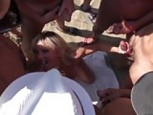 Dozens strangers men pour blonde on beach Cap d'Agde