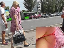 Amateur blonde upskirt presents delicious butt