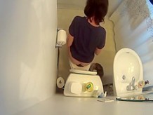 Hidden cam over the toilet catches woman peeing