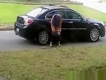 Totally drunk woman peeing on cars