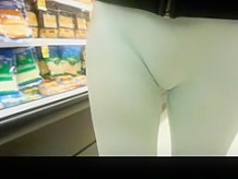 Woman in tight white panties at the supermarket