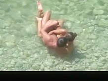 Nudist couple made sex in the water