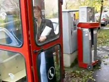 cabina telefónica masturbación con la mano