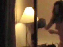 Ventana : Pareja teniendo sexo